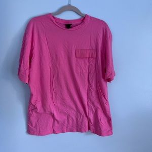 H&M pink t-shirt with one pocket in front. Size L